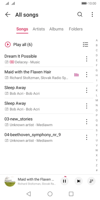 Press the song title at the bottom of the screen.