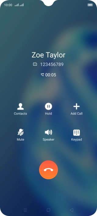 Press the end call icon.