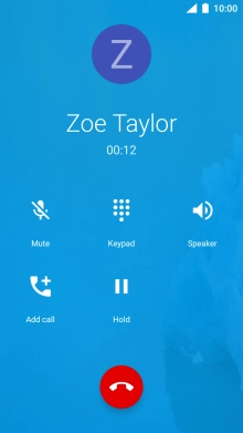 Press the end call icon.