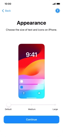Select the required text and icon size on your phone and press Continue.