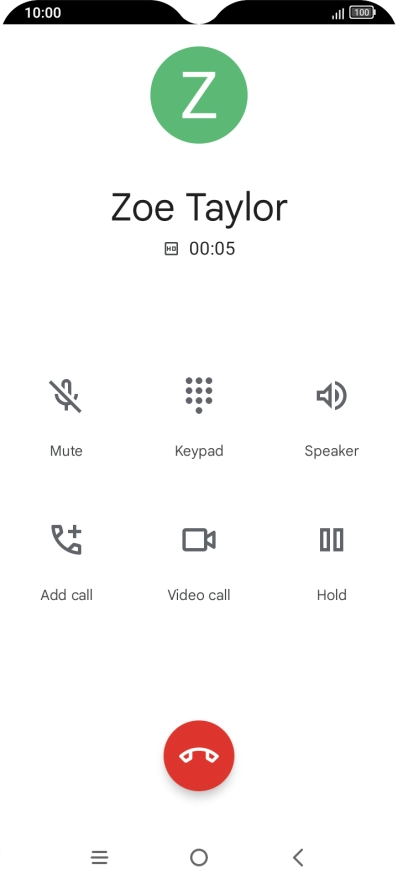 Press the end call icon.