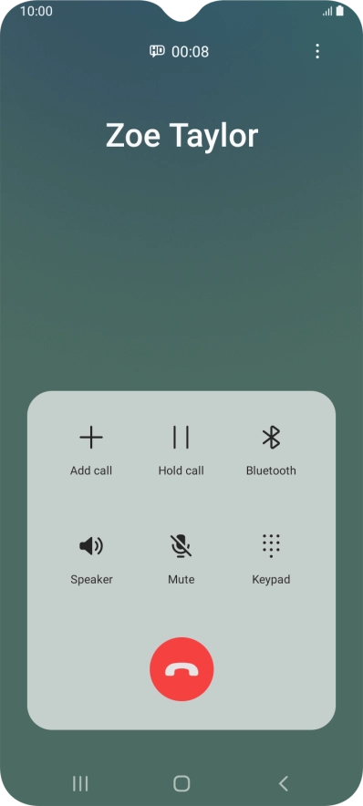 Press the end call icon.