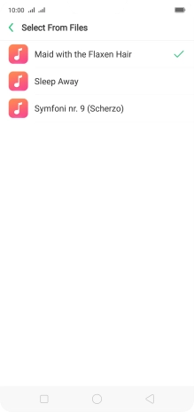 Once you've found a ring tone you like, press the Return key.