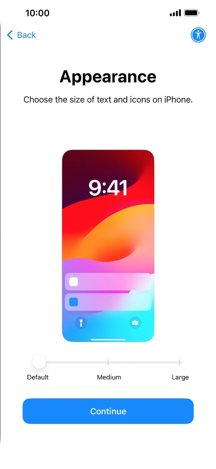 Select the required text and icon size on your phone and press Continue.