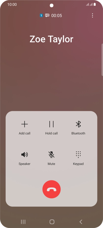 Press the end call icon.