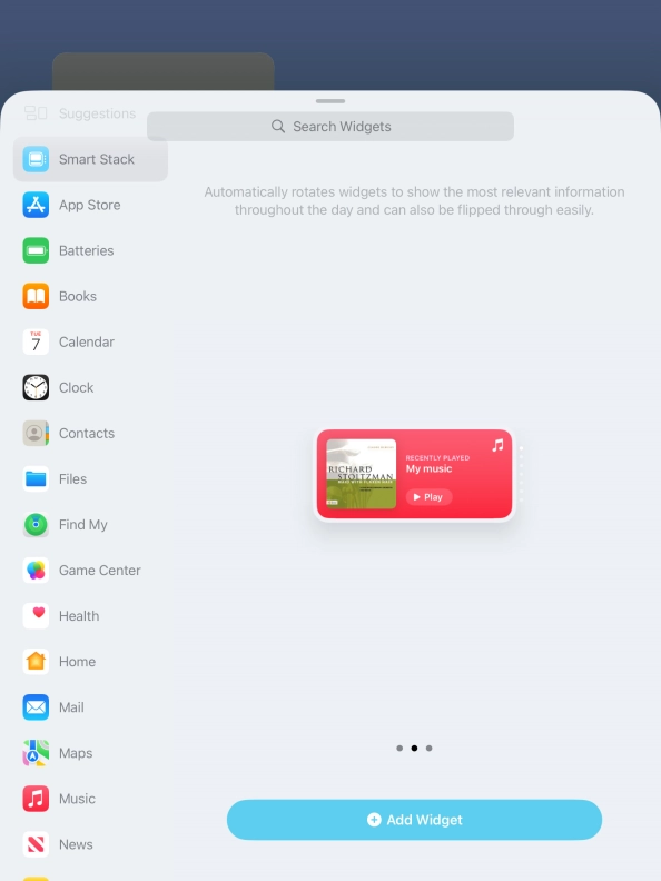 Slide your finger right or left on the screen to select the required widget size.