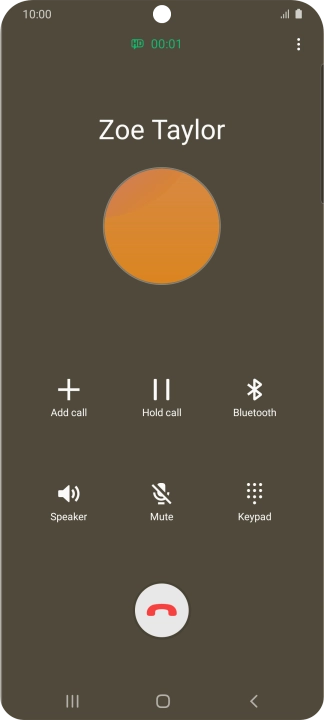 Press the end call icon.