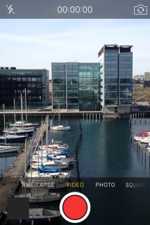 Slide your finger right or left on the screen to select PHOTO.