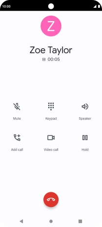 Press the end call icon.