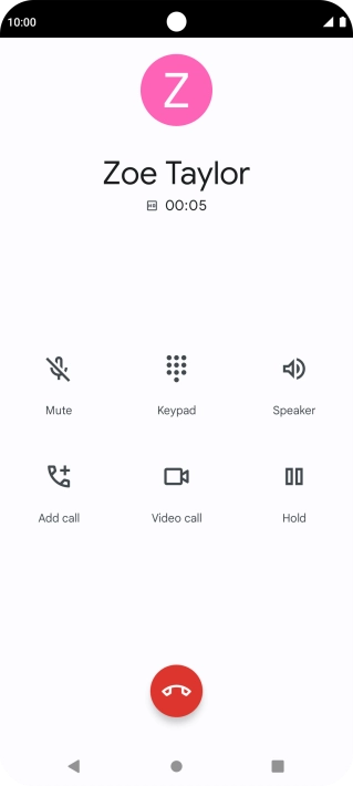 Press the end call icon.