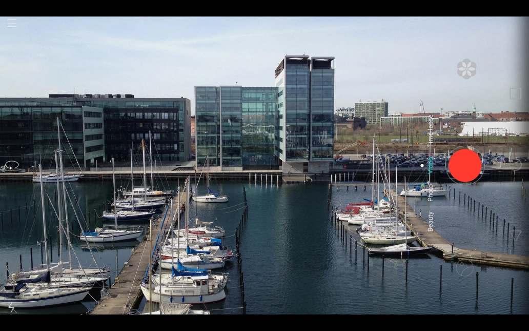 If the video recorder is turned on, press Photo.