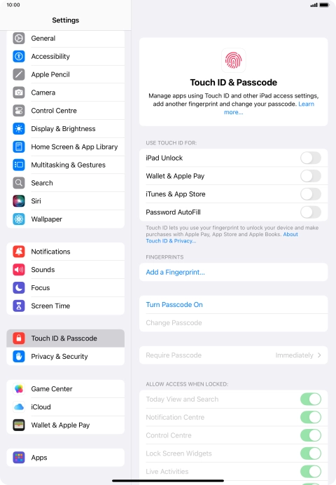 Press Turn Passcode On and key in a lock code of your own choice twice.
