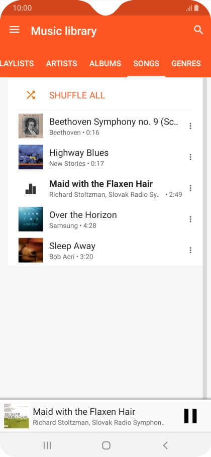 Press the song title at the bottom of the screen.