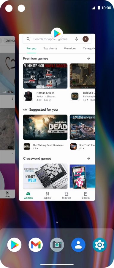 Slide your finger right starting from the left side of the screen.