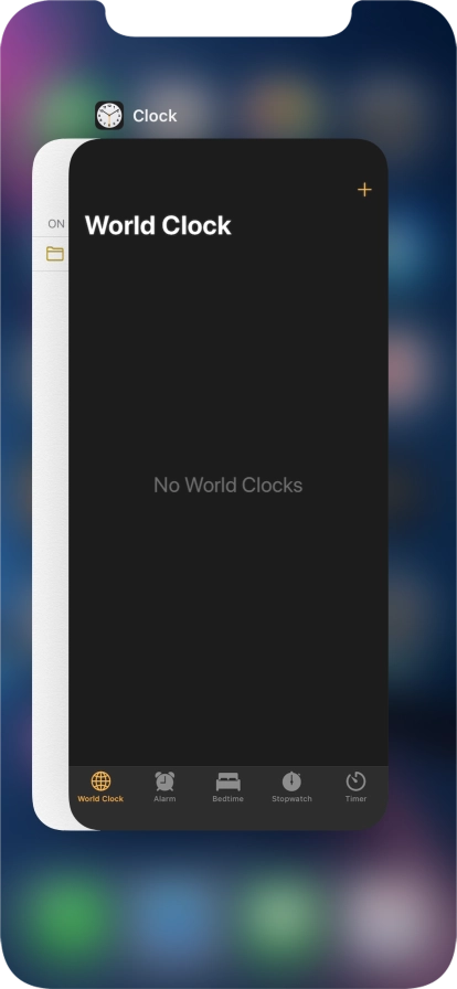Slide upwards on the required application to end it.