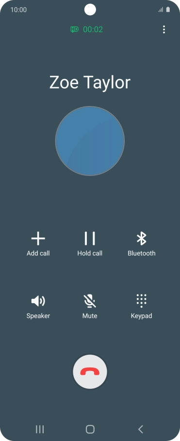 Press the end call icon.
