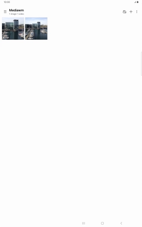 Press and hold the required picture or video.