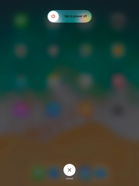 Press and drag the power off icon right.