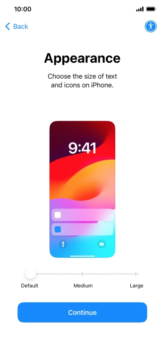Select the required text and icon size on your phone and press Continue.