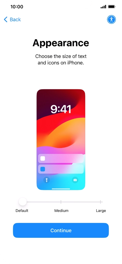 Select the required text and icon size on your phone and press Continue.