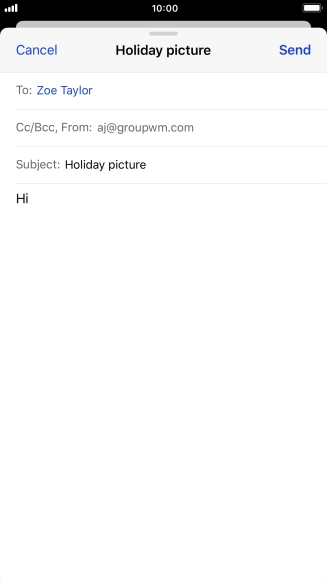 Press and hold the text input field until a pop-up menu is displayed.