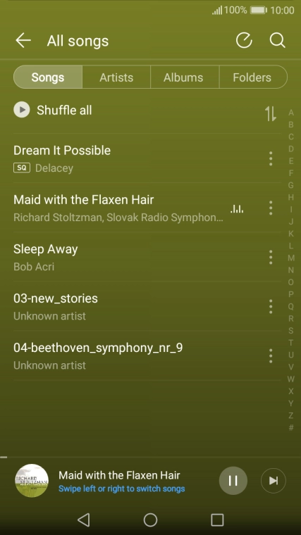 Press the song title at the bottom of the screen.