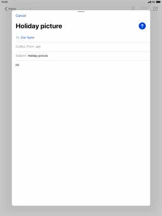 Press and hold the text input field until a pop-up menu is displayed.