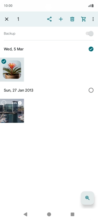 Press the required pictures or videos to select them.