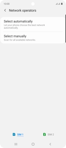 Press Select manually and your phone will search for networks.