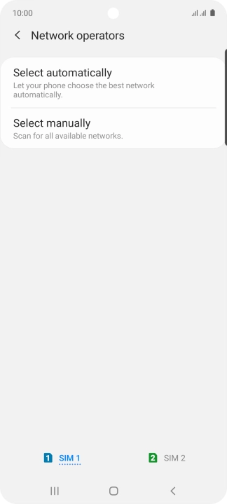Press Select manually and your phone will search for networks.