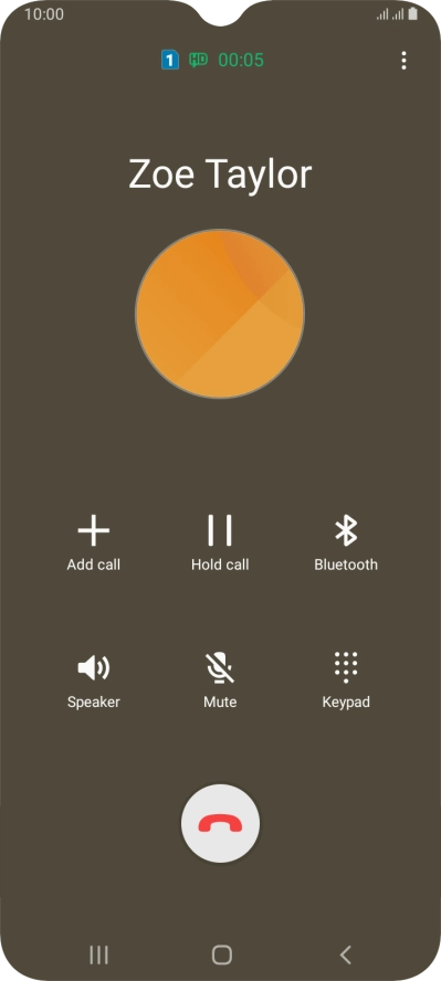 Press the end call icon.