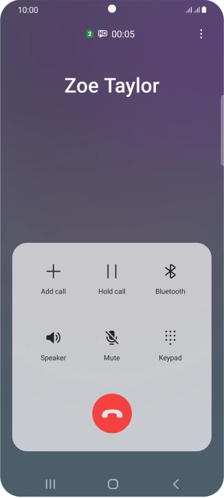 Press the end call icon.