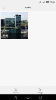 Slide your finger right starting from the left side of the screen.