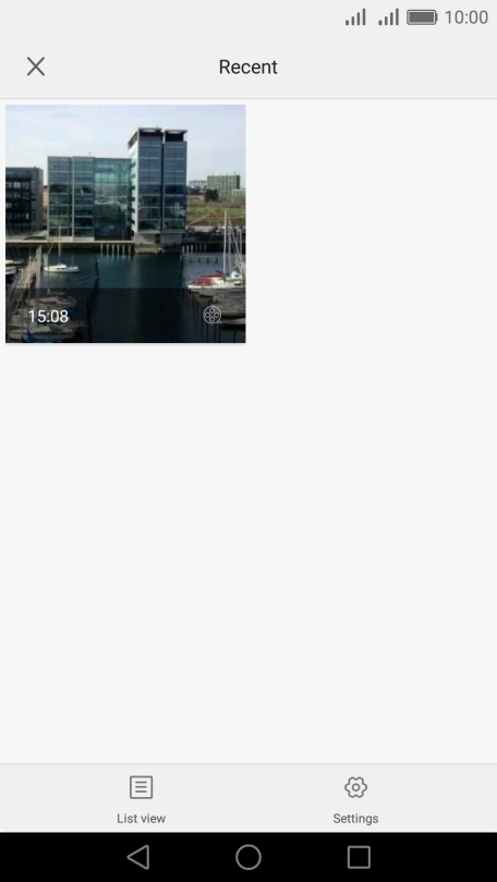 Slide your finger right starting from the left side of the screen.