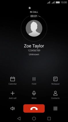 Press the end call icon.