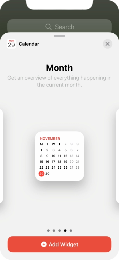 Slide your finger right or left on the screen to select the required widget size.