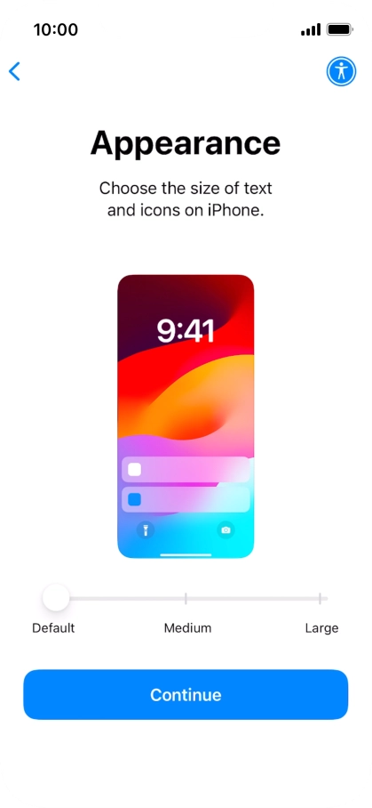 Select the required text and icon size on your phone and press Continue.