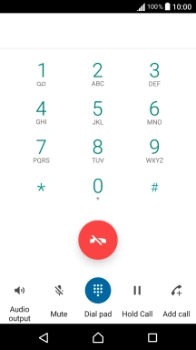 Press the end call icon.