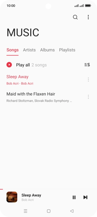 Press the song title at the bottom of the screen.