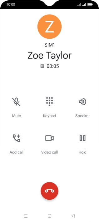 Press the end call icon.