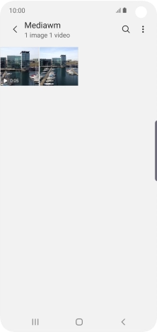 Press and hold any picture or video clip. Press and hold any picture or video clip.