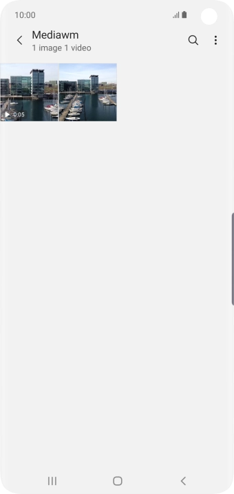 Press and hold any picture or video clip.