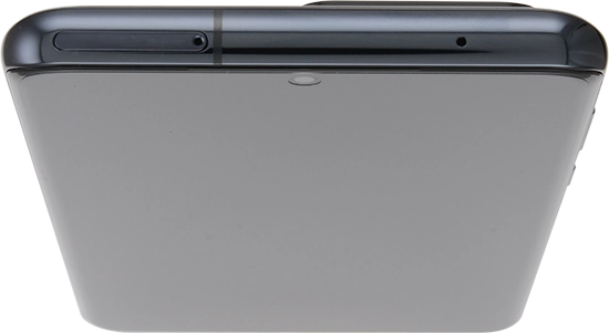 Find the opener for the card holder. Insert the opener into the small hole in the card holder.