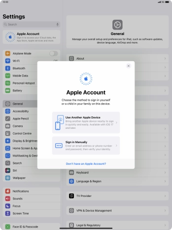 Press Sign in Manually. Press Sign in Manually.
