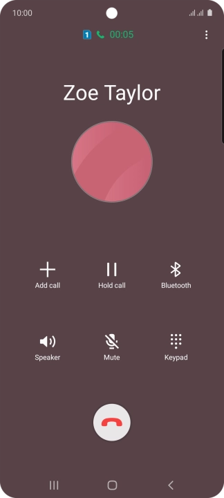 Press the end call icon.
