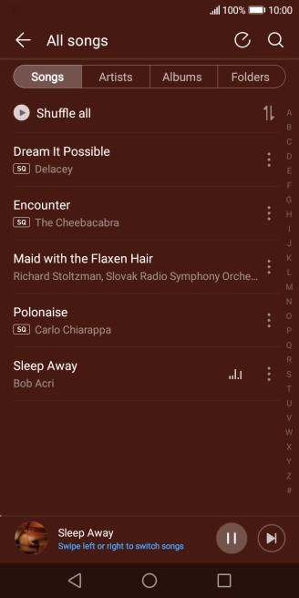 Press the song title at the bottom of the screen.