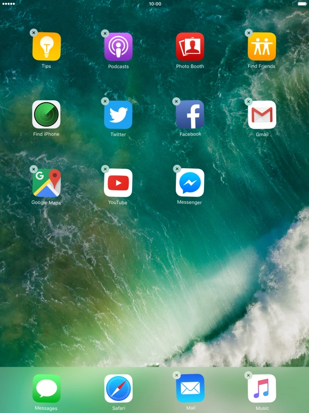 Press and hold the required app until the icons start to jiggle.