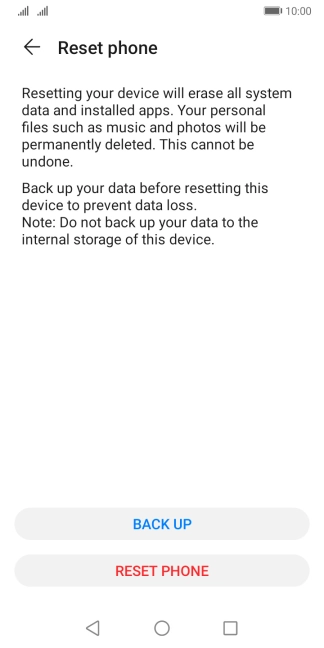 Press RESET PHONE. Wait a moment while the factory default settings are restored. Follow the instructions on the screen to set up your phone and prepare it for use.