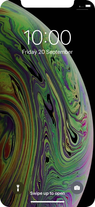 Slide your finger upwards starting from the bottom of the screen.