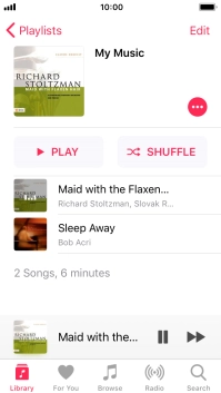 Press the song title at the bottom of the screen.